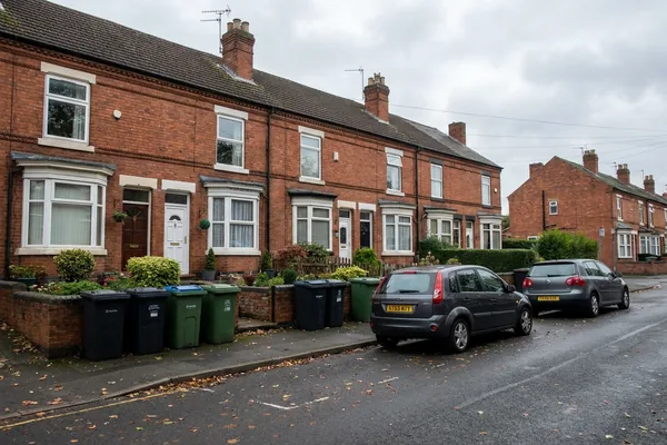 A quiet street of ordinary terraced houses in a Northamptonshire town